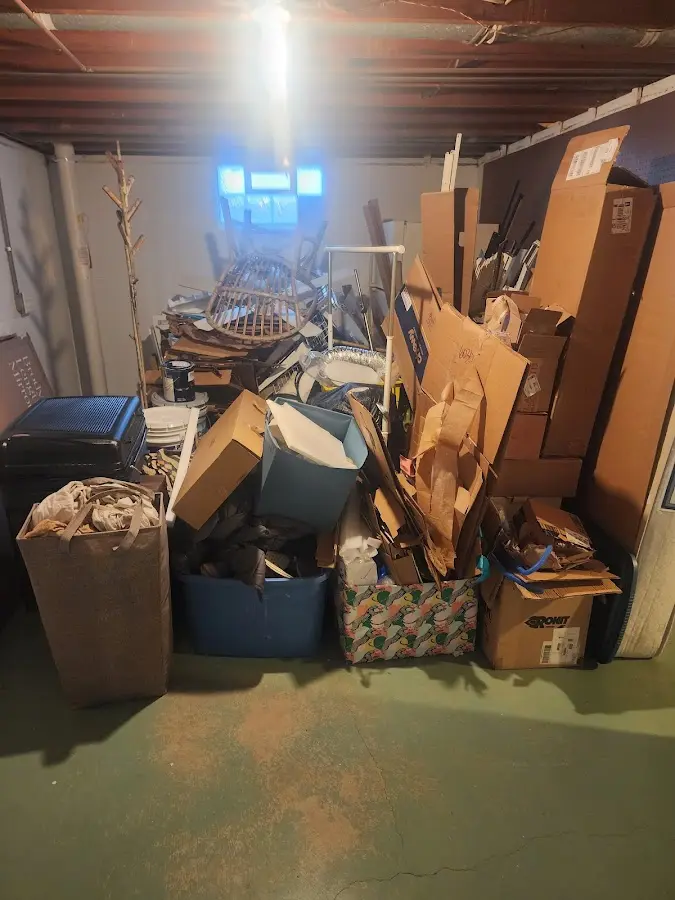 Roll-off dumpster container at job site for Construction Dumpster Rental in Hamilton